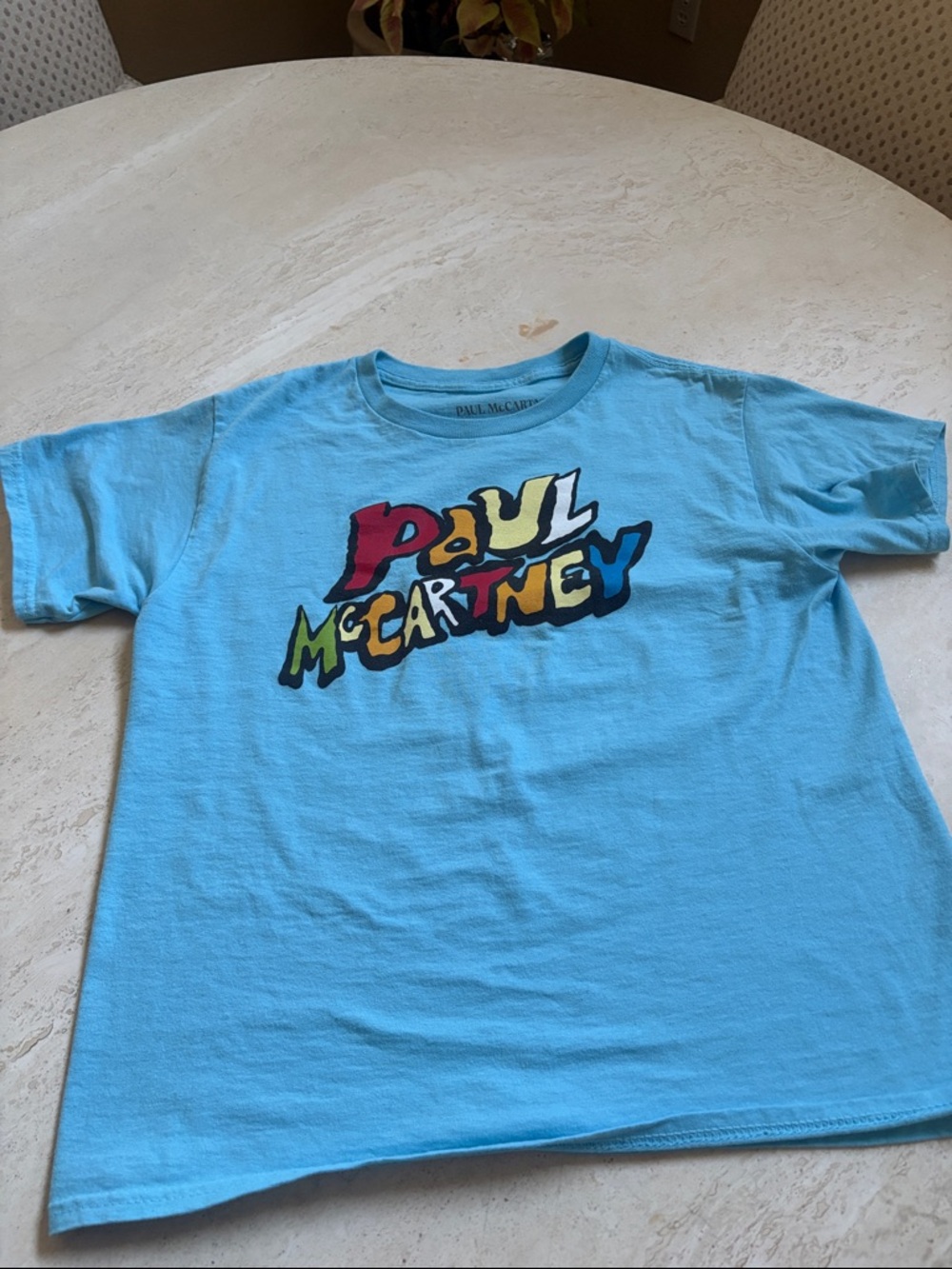 Kids/ women' Graphic T-Shirt in Light Blue.
Fits like small woman